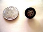 # 145 5 SILVER FILIGREE CENTER 58 MATTE BLACK & SILVER BUTTONS