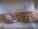 4YDS-MAJESTIC-METALLIC-GOLD-MARCHING-ELEPHANTS-ON-METALLIC-SILVER-TRIM-1.5-wide-1