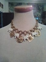 VINTAGE-GOLDEN-CHOKER-NECKLACE-FAUX-IVORY-ELEPHANT-LIONSHEAD-CHARMS-EARRINGS-1